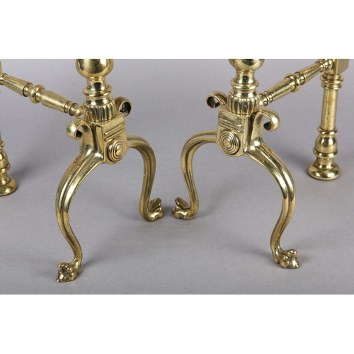 50 - A PAIR OF VICTORIAN BRASS FIRE DOGS, each having a reeded ball and baluster upright with knop finial... 