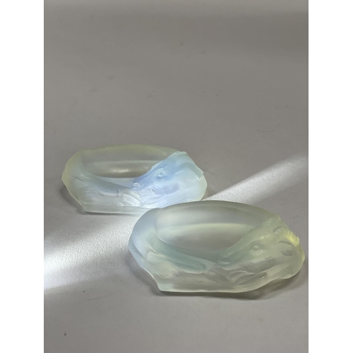 144 - A PAIR OF JOBLING OPALIQUE GLASS HART SALT CELLARS, of oval outline, reg no. 795460, Jobling catalog... 