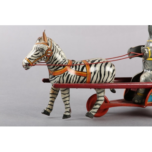 33 - A GERMAN US ZONE TINPLATE CLOCKWORK ELEPHANT AND ZEBRA CIRCUS ACT, 24cm wide x 21.5cm high, together... 