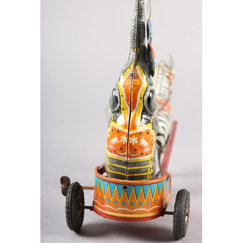 33 - A GERMAN US ZONE TINPLATE CLOCKWORK ELEPHANT AND ZEBRA CIRCUS ACT, 24cm wide x 21.5cm high, together... 