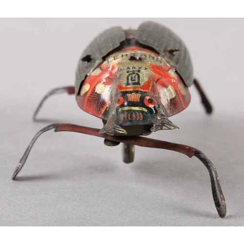 32 - A LEHMANN TINPLATE CLOCKWORK CRAWLING BEETLE, no 431 with lithographed decoration, approximate 9.5cm... 