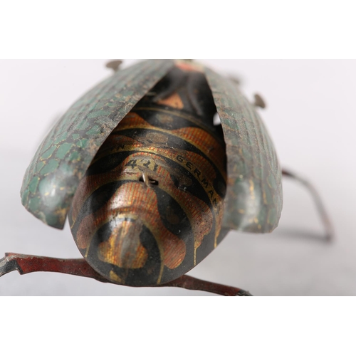 32 - A LEHMANN TINPLATE CLOCKWORK CRAWLING BEETLE, no 431 with lithographed decoration, approximate 9.5cm... 