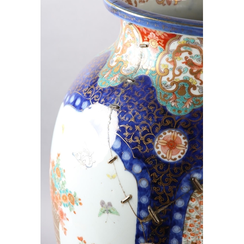 112 - A LARGE JAPANESE POTTERY VASE,  Meiji period, now converted to a table lamp, the ovoid body painted ... 