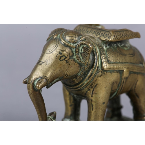 54 - A LATE 18TH/EARLY 19TH CENTURY BRASS CAPARISONED ELEPHANT, cast and engraved in the South Indian or ... 