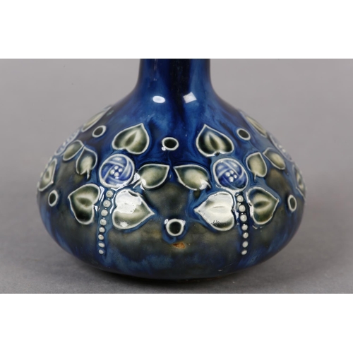 93 - A DOULTON STONEWARE VASE OF SECESSIONIST DESIGN, having a flat rim and long narrow neck to the compr... 