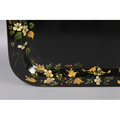 73 - A MID-19TH CENTURY PAPIER MÂCHÉ TRAY, rectangular with rounded corners, the black ground painted and... 