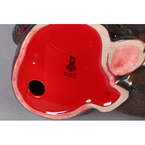 87 - A ROYAL DOULTON VEINED FLAMBE RHINO, modelled in recumbent position, marked to the base with stamp i... 