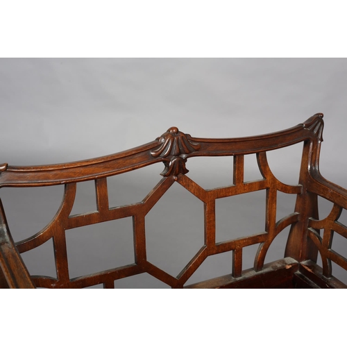 376 - A CHINESE CHIPPENDALE REVIVAL mahogany dressing stool, having a low fretwork back and side panels, n... 