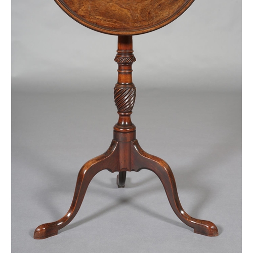 378 - A GEORGE III MAHOGANY TILT TOP TABLE, dished circular top on a wrythen turned vase column on a tripo... 