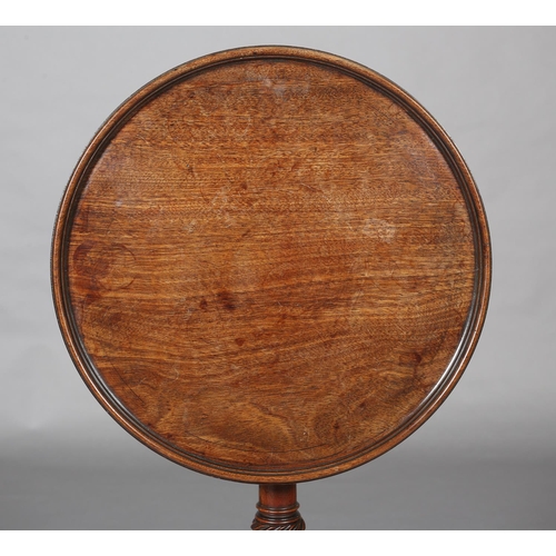 378 - A GEORGE III MAHOGANY TILT TOP TABLE, dished circular top on a wrythen turned vase column on a tripo... 