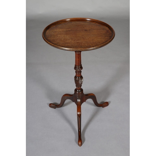 378 - A GEORGE III MAHOGANY TILT TOP TABLE, dished circular top on a wrythen turned vase column on a tripo... 