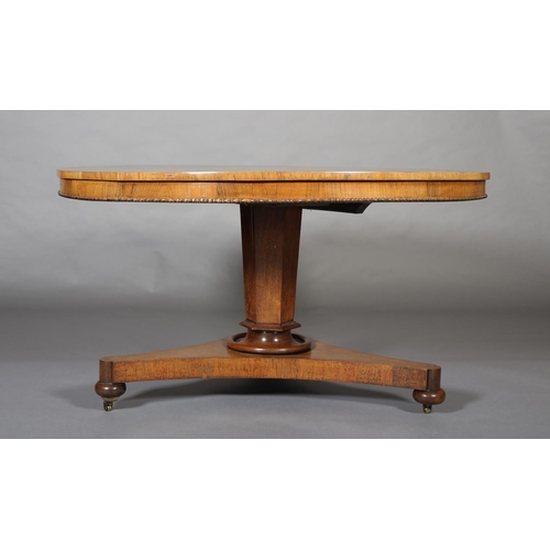 372 - A MID 19TH CENTURY ROSEWOOD BREAKFAST TABLE, having a circular tilt top with bead and reel to the fr... 