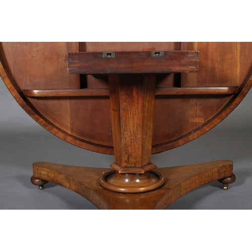 372 - A MID 19TH CENTURY ROSEWOOD BREAKFAST TABLE, having a circular tilt top with bead and reel to the fr... 