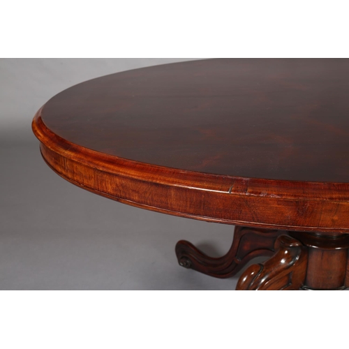 387 - A VICTORIAN LOOE TABLE, having an oval tilt top, on short lobed column and quadruple base with hippe... 