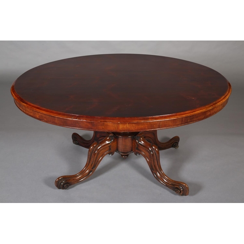 387 - A VICTORIAN LOOE TABLE, having an oval tilt top, on short lobed column and quadruple base with hippe... 