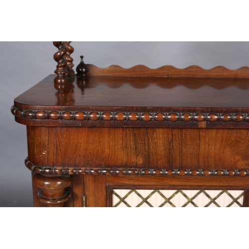 373 - A MID-19TH CENTURY ROSEWOOD CHIFFONIER, having three open shelves each with a short wavy back and on... 