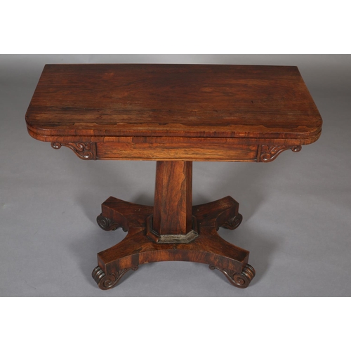 388 - A MID VICTORIAN ROSEWOOD CARD TABLE, having a rectangular fold over top with rounded corners and lin... 