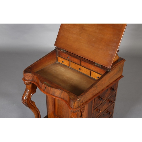 389 - A MID VICTORIAN WALNUT DAVENPORT, with raised stationery compartment, leather incised fall front of ... 