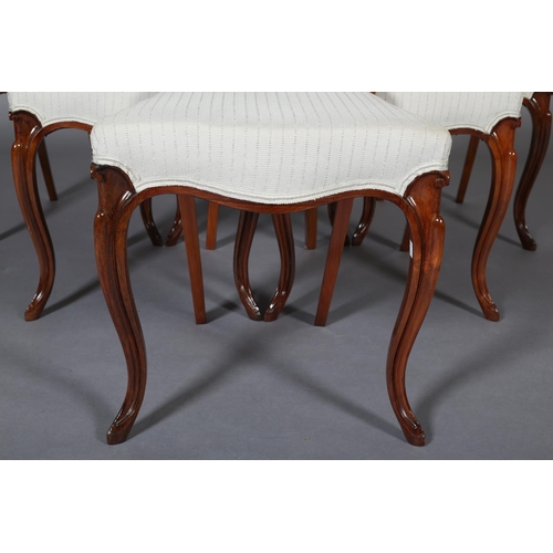 390 - A SET OF SIX VICTORIAN-STYLE MAHOGANY BALLOON BACK DINING CHAIRS, with foliate carved tie rail and u... 