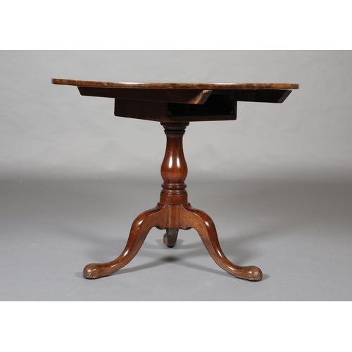 393 - A GEORGE III MAHOGANY 'BIRDCAGE' TRIPOD TABLE, having a circular tilt top on a vase turned column an... 