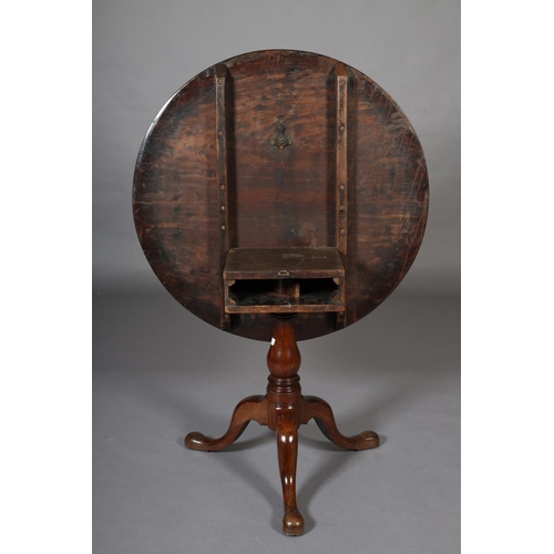 393 - A GEORGE III MAHOGANY 'BIRDCAGE' TRIPOD TABLE, having a circular tilt top on a vase turned column an... 