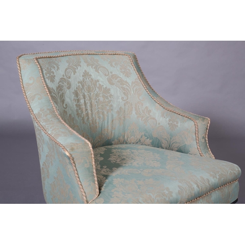 400 - A VICTORIAN PALE GREEN UPHOLSTERED NURSING CHAIR, on turned ebonised legs with castors