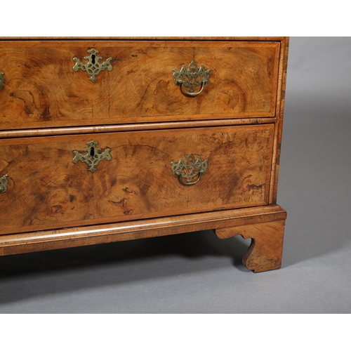 363 - AN 18TH CENTURY FIGURED WALNUT CHEST OF DRAWERS, the top quarter veneered and crossbanded with chevr... 