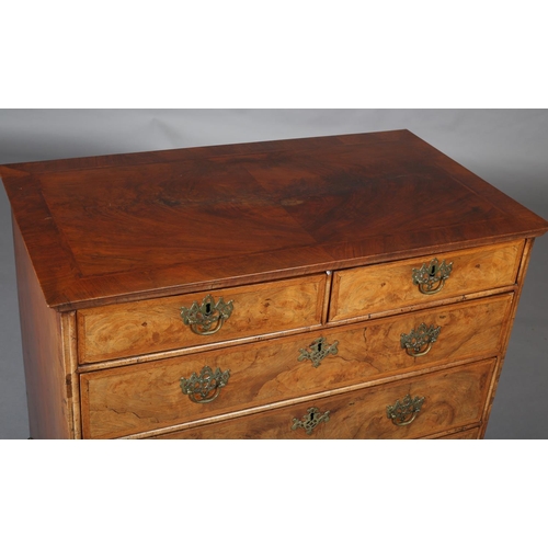 363 - AN 18TH CENTURY FIGURED WALNUT CHEST OF DRAWERS, the top quarter veneered and crossbanded with chevr... 