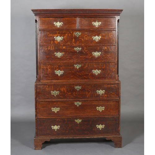 429 - A GEORGE III OAK CHEST ON CHEST, having a moulded cornice and dentil cornice above two short and thr... 