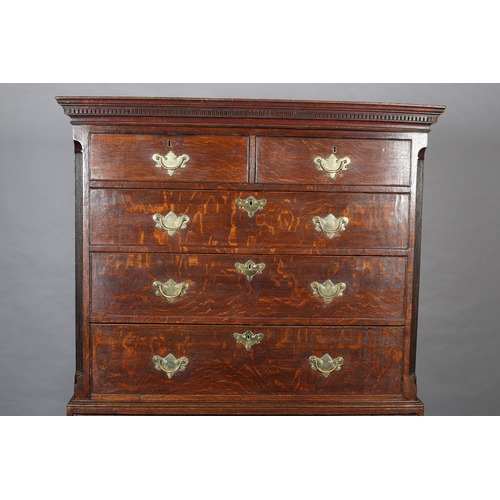 429 - A GEORGE III OAK CHEST ON CHEST, having a moulded cornice and dentil cornice above two short and thr... 