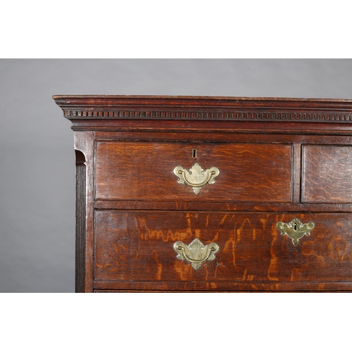 429 - A GEORGE III OAK CHEST ON CHEST, having a moulded cornice and dentil cornice above two short and thr... 