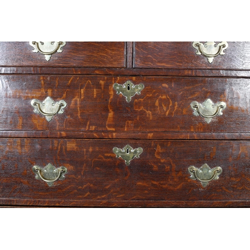 429 - A GEORGE III OAK CHEST ON CHEST, having a moulded cornice and dentil cornice above two short and thr... 