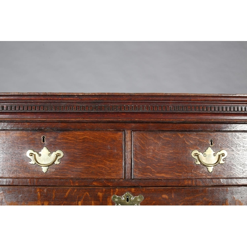 429 - A GEORGE III OAK CHEST ON CHEST, having a moulded cornice and dentil cornice above two short and thr... 