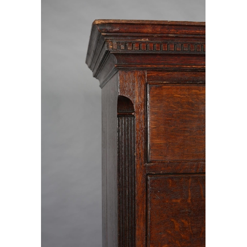 429 - A GEORGE III OAK CHEST ON CHEST, having a moulded cornice and dentil cornice above two short and thr... 