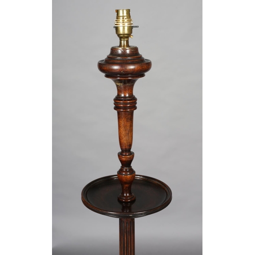 404 - AN EARLY 20th CENTURY MAHOGANY STANDARD LAMP on a fluted and reeded column with lobed collar, on tri... 