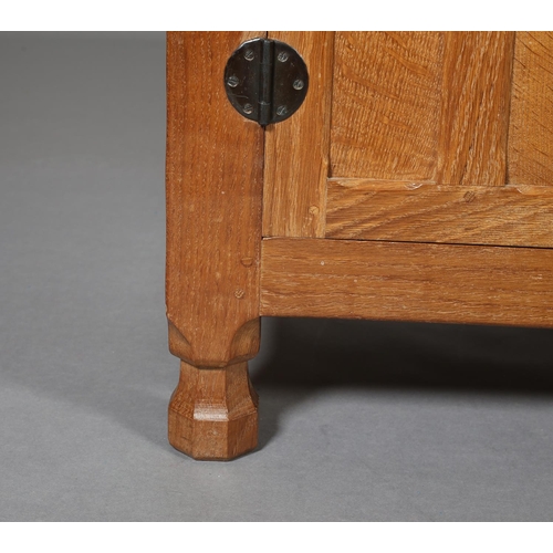 360B - SCHOOL OF THOMPSON OF KILBURN
AN ADZED OAK SIDEBOARD having two short and three long drawers flanked... 