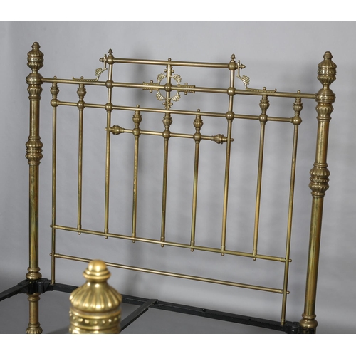 419 - A VICTORIAN BRASS BED having railed head and foot, with fanned and beaded decoration, cup and cover ... 