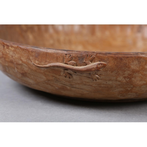 361 - A DEREK SLATER 'LIZARD MAN' OAK BOWL, circular, carved in high relief to the rim with a lizard, the ... 