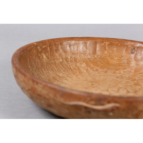 361 - A DEREK SLATER 'LIZARD MAN' OAK BOWL, circular, carved in high relief to the rim with a lizard, the ... 