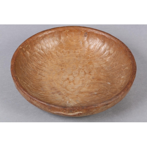 361 - A DEREK SLATER 'LIZARD MAN' OAK BOWL, circular, carved in high relief to the rim with a lizard, the ... 