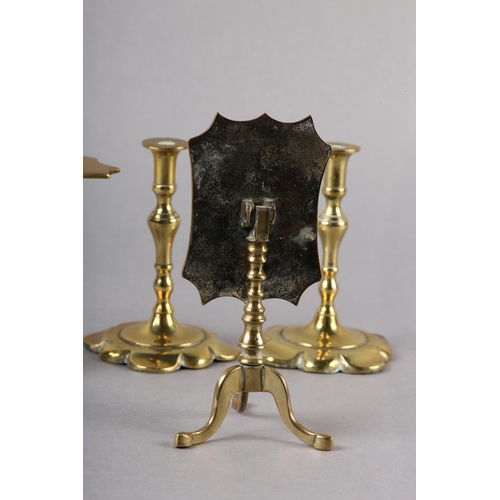 56 - A PAIR OF EARLY 19TH CENTURY BRASS CANDLESTICKS, inverted baluster stem and petalated square base, 1... 