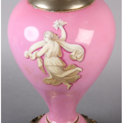 20 - A VICTORIAN PINK PORCELAIN AND BRASS OIL LAMP BY WRIGHT & BUTLER, the inverted baluster body printed... 