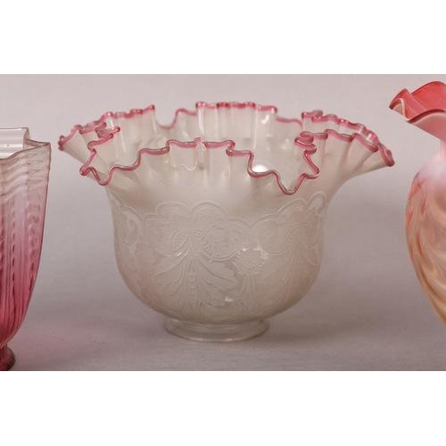 25 - A VICTORIAN PINK TINTED OPALINE WAVY MOULDED GLASS SHADE with folded rim and neck together with two ... 