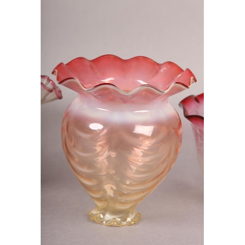 25 - A VICTORIAN PINK TINTED OPALINE WAVY MOULDED GLASS SHADE with folded rim and neck together with two ... 