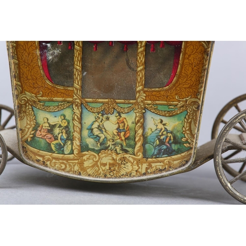 36 - A W&R JACOB & CO LTD TIN PLATE BISCUIT TIN formed as a coach, the side panels containing classical s... 