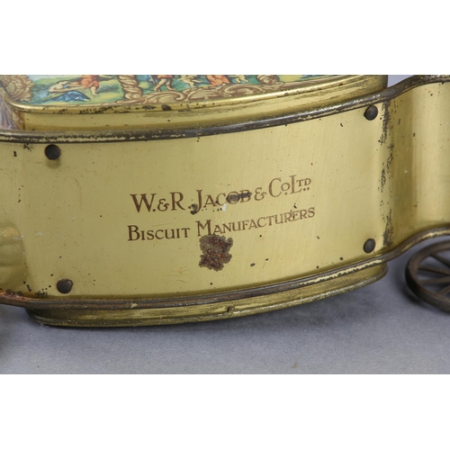 36 - A W&R JACOB & CO LTD TIN PLATE BISCUIT TIN formed as a coach, the side panels containing classical s... 