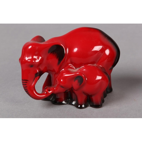 91 - FOUR ROYAL DOULTON VEINED FLAMBE FIGURES OF AN ELEPHANT MOTHER AND CHILD GROUP, DUCK, FOX AND CAT, m... 