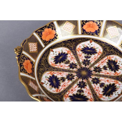 97 - A ROYAL CROWN DERBY IMARI PATTERN TWIN HANDLED BONBON DISH, date cypher for 1825, 25cm diameter