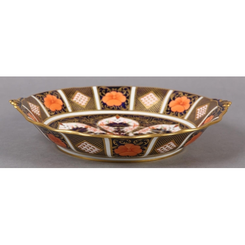 97 - A ROYAL CROWN DERBY IMARI PATTERN TWIN HANDLED BONBON DISH, date cypher for 1825, 25cm diameter