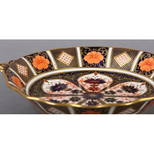 97 - A ROYAL CROWN DERBY IMARI PATTERN TWIN HANDLED BONBON DISH, date cypher for 1825, 25cm diameter